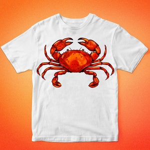 May include: White t-shirt with a red crab illustration on the front. The crab is facing forward with its claws raised.