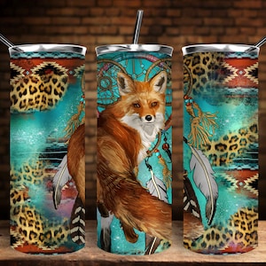 May include: A turquoise and brown tumbler with a fox and dreamcatcher design. The tumbler has a leopard print pattern and a turquoise background.