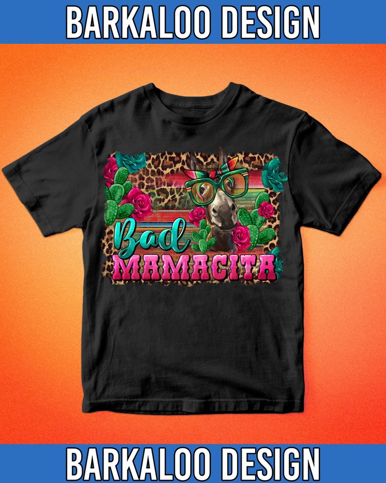 May include: Black t-shirt with a graphic of a donkey wearing sunglasses and a bandana. The donkey is surrounded by cacti and flowers. The text "Bad Mamacita" is written below the donkey.