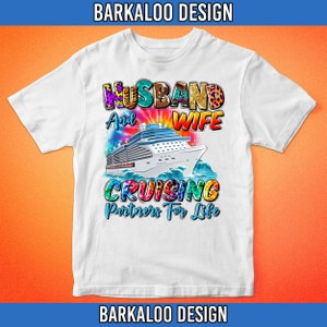 May include: White t-shirt featuring a colourful graphic design that reads "Husband and Wife Cruising Partners For Life". The design includes a cruise ship and a vibrant tie-dye background.