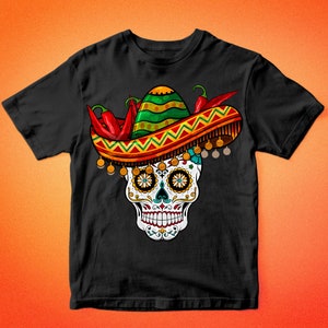 May include: Black t-shirt with a colorful sugar skull wearing a sombrero with red chili peppers. The skull has intricate details and is surrounded by a festive design.