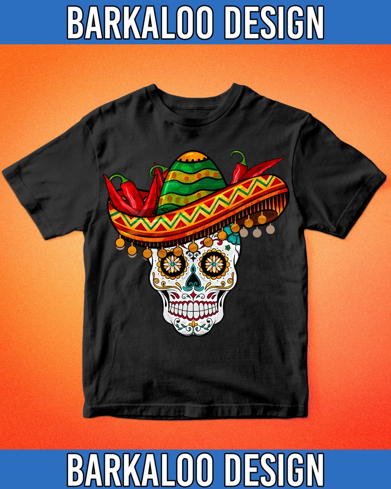 May include: Black t-shirt with a colorful sugar skull wearing a sombrero with red chili peppers. The skull has intricate details and is surrounded by a festive design.