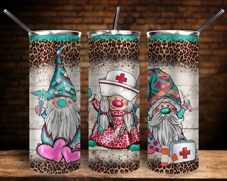 May include: Three stainless steel tumblers with a leopard print design and a white wood background. Each tumbler features a different gnome dressed as a medical professional. One gnome is a doctor, one is a nurse, and one is a first responder.