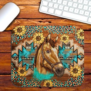 May include: A brown horse head with a turquoise and brown geometric pattern behind it. The pattern is surrounded by a leopard print border with yellow sunflowers.