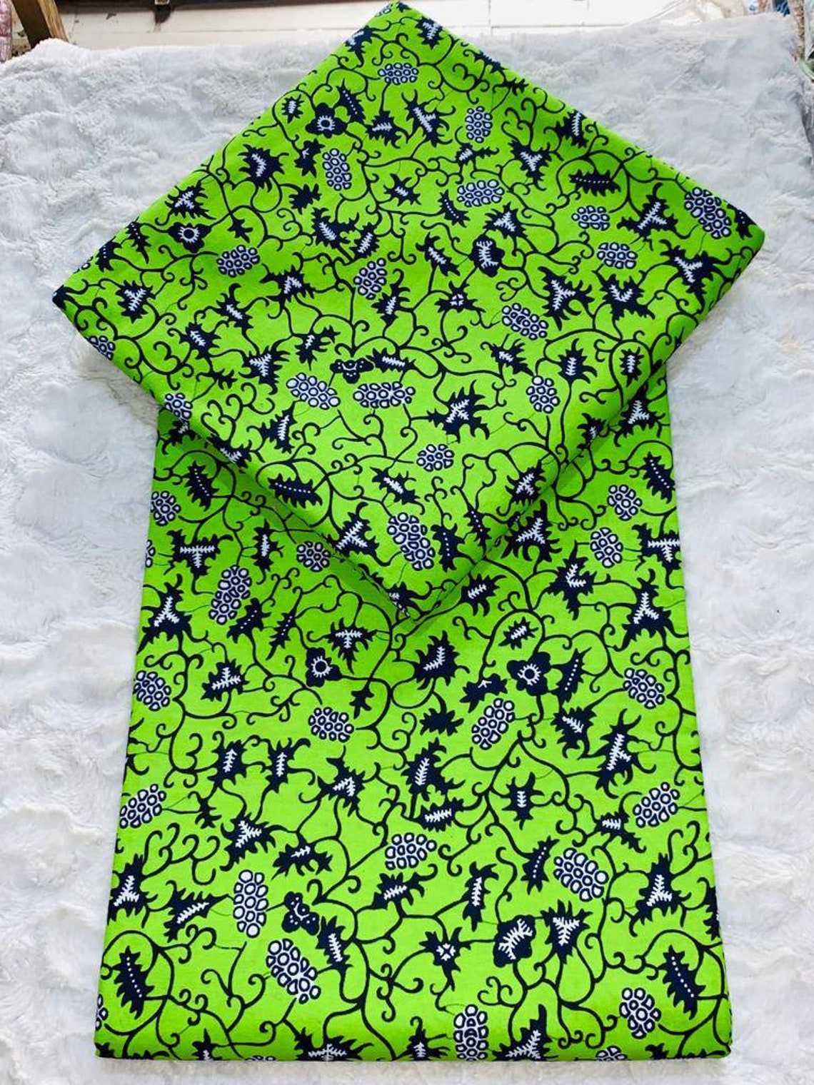 Floral Blue and Beige Ankara Wax Print Fabric with Radiating Flower Design