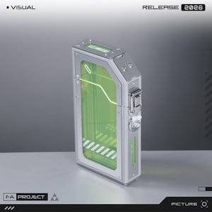 May include: A rectangular silver metal case with a translucent lime green panel. The frame features exposed screws, a side-mounted metal latch, and a small ring attachment. The top surface displays the text "2026" and the front panel has white diagonal stripes.
