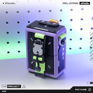 May include: A futuristic, box-shaped device with a purple frame, black panels, and a silver buckle closure. It features a neon green strap and a metal ring. The top has a gold-colored cylindrical component. Text on the device reads "RELEASE 2025" and "F-A PROJECT".
