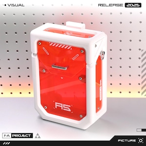 May include: A white and red rectangular device with a transparent red front panel. The device has a handle and is secured with silver screws. The text "RS" is visible on the front panel. The top of the device has the text "RELEASE 2025".