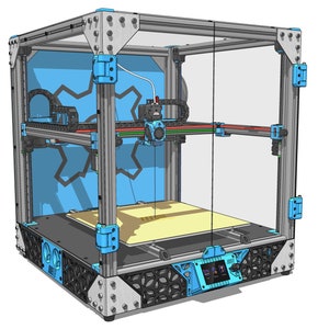 Könnte beinhalten: Ein 3D-Drucker mit einem blauen und grauen Rahmen, einem transparenten Kunststoffgehäuse und einer hellbraunen Bauplatte. Der Drucker hat ein schwarz-weißes Bedienfeld an der Vorderseite.