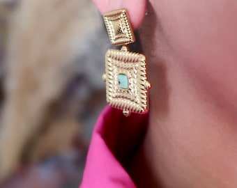 Guldfärgade örhängen