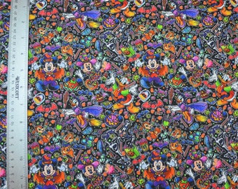 May include: Black fabric with a Halloween-themed print featuring Mickey Mouse, Donald Duck, and other Disney characters. The print includes candy, bats, pumpkins, and other Halloween imagery.