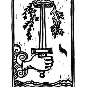 May include: Black and white illustration of the Ace of Swords tarot card. A sword with a crown on top is held by a hand emerging from a cloud. The card is framed with a black border and the text "ACE of SWORDS" is printed at the bottom.