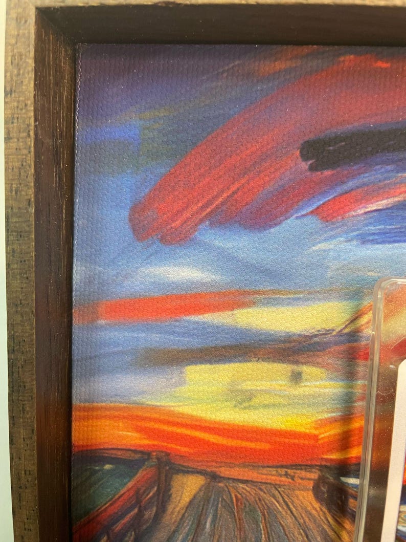 May include: A framed print of a painting with a swirling, abstract sky in shades of blue, red, yellow, and orange. The sky is painted with thick, visible brushstrokes.