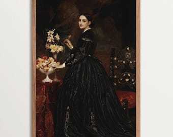May include: A framed portrait of a woman in a black dress, standing near a table with a floral arrangement. The painting has a dark, classical style with a wooden frame. The woman is the focal point, with a serious expression.