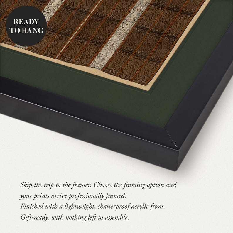 Close up of a brown and cream antique textile art print displayed with a deep green mat and slim black frame. Intricate geometric woven patterns create richly detailed vintage wall art, shown with the professionally framed ready to hang option.