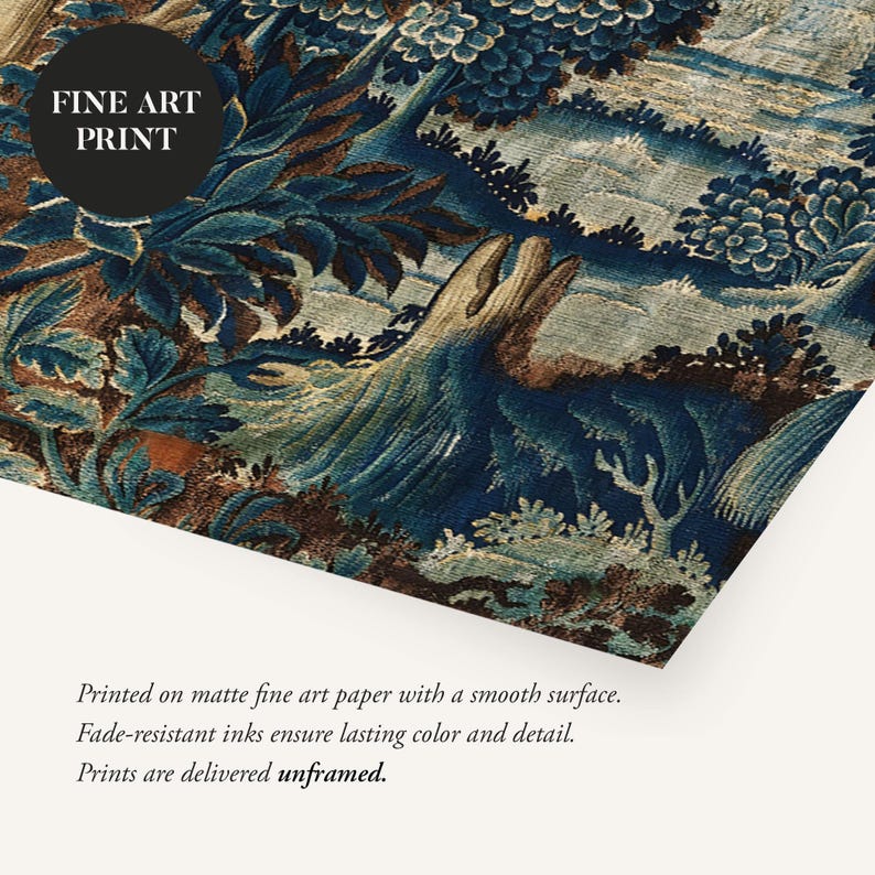 A matte fine art print of a blue verdure tapestry scene shown close to the surface with visible woven texture and rich botanical details. The archival paper and vibrant colors emphasize the depth of this vintage textile wall art.