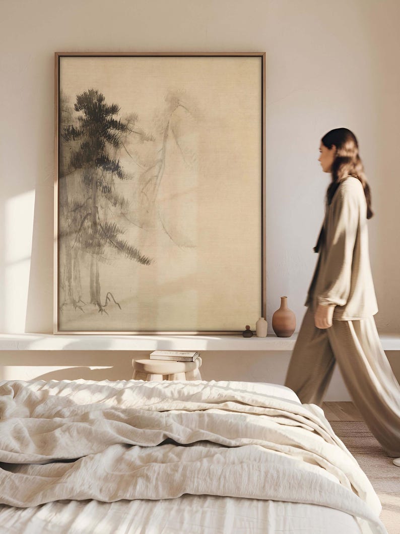 Framed Japanese sumi-e ink painting on a large canvas, depicting misty pine trees in a traditional Zen-inspired style. Displayed in a modern bedroom with neutral decor, emphasizing a calming, meditative ambiance.