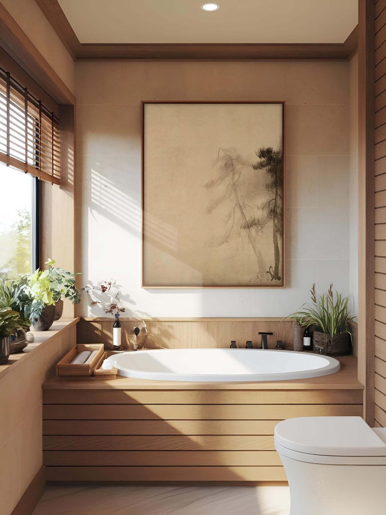 Wabi-sabi framed canvas wall art with a serene pine tree design, displayed above a wooden bathtub in a bright, natural light-filled bathroom with soft beige tones.