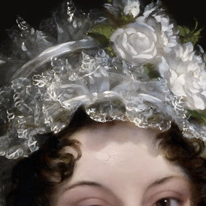 Close-up of the portrait print shwoing the face of a woman with a white lace headpiece decorated with flowers.