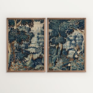 Two framed verdure tapestry prints with detailed blue foliage and soft aged tones are presented side by side. The coordinated diptych design highlights the rich botanical landscape and classic textile style of the wall art set.