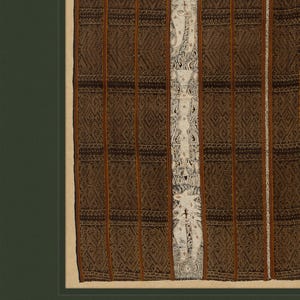 Close-up of antique textile print showing intricate brown and cream woven geometric patterns, highlighting fabric texture and fine details.