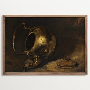 A dark, vintage-inspired still life art print depicting a brass teapot and lid. The artwork is framed in a natural wood frame, with rich golden tones and shadows creating a moody, antique atmosphere.
