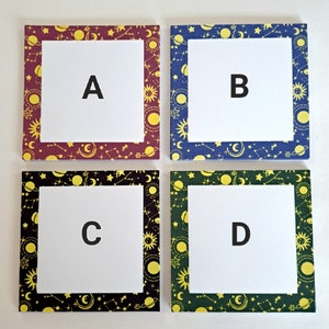 May include: Four square sticky notes with a celestial pattern border. Each note has a letter, A, B, C, and D, printed in black in the center.