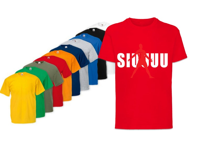 May include: A variety of t-shirts in different colors, including yellow, green, red, orange, blue, and grey. One t-shirt is red with a white silhouette of a person playing basketball and the text "SHUU" in white.