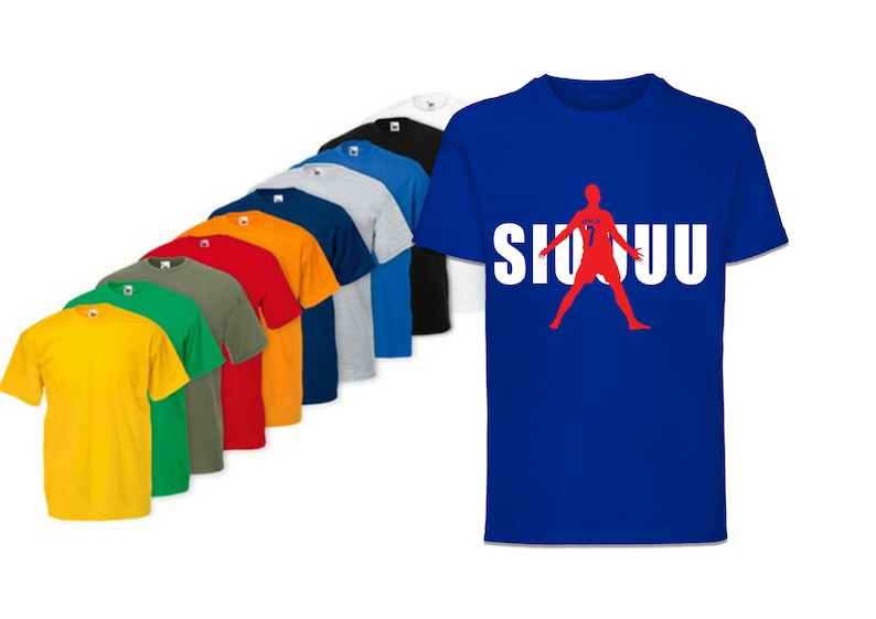May include: A collection of t-shirts in various colors, including yellow, green, red, orange, and blue. The t-shirts feature a silhouette of a soccer player with the word "SIUUU" printed in white.