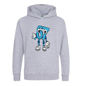 May include: A light gray hooded sweatshirt featuring a cartoon character made of the letters "67" in blue. The character has arms, legs, and shoes, with a friendly expression. The sweatshirt has a front pocket and a hood.