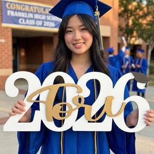 graduation event decor using custom wood sign display