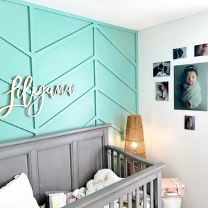 name decoration for girl wall
name door sign
name for nursery wall
name for sign for nursery girl
name for the wall
name for wall decor
name for wall of nursery
name in wood sign
name letter sign
name letters
name letters for nursery
name monogram