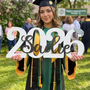 graduation table decor with custom sign centerpiece