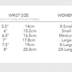 May include: A black and white sizing chart titled WRIST SIZE shown in inches and centimeters, listing measurements from 5.5 inches to 8 inches alongside corresponding metric values and size labels ranging from X-Small to 2X-Large for women.