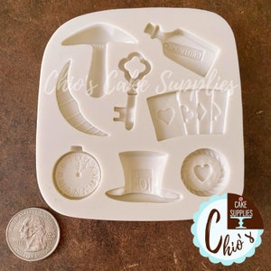 Mushroom, key, hat, bottle, clock Silicone Mold, 8 cavities.