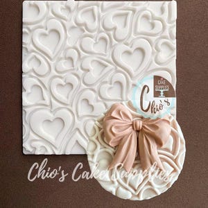 Alfombrilla de silicona con textura de corazones