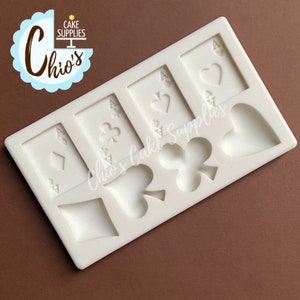 Poker ases and playing card symbols. Casino themed silicone mold. 8 cavities.