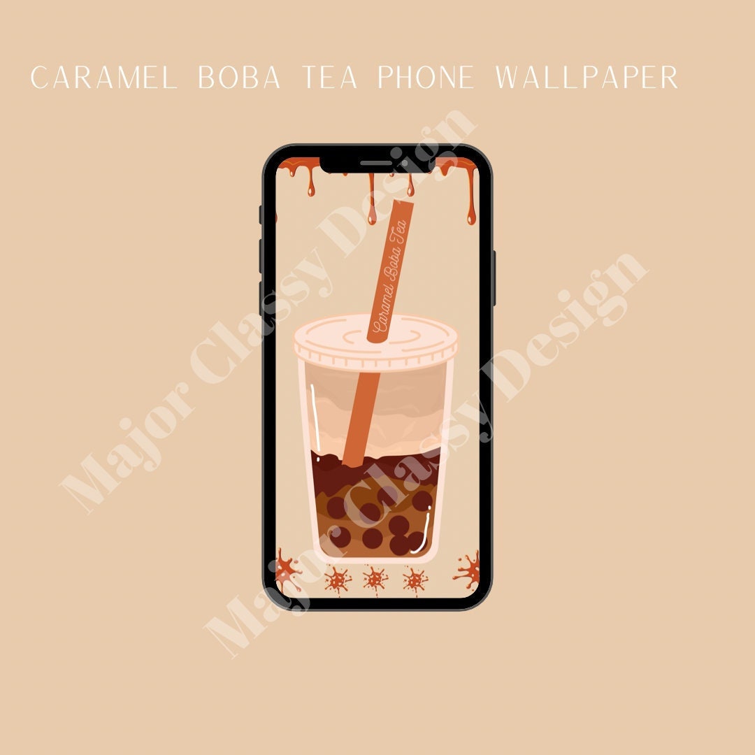 Caramel Boba Tea Phone Wallpaper: Thưởng thức ly trà sữa Caramel Boba mềm mại, thật đáng ngưỡng mộ! Bức ảnh liên quan đem lại cho bạn hình nền điện thoại hoặc máy tính đẹp mắt với nước trà caramel thơm ngon và viên bọt đen mịn màng. Hãy xem và sử dụng bức ảnh này để chọn cho mình món trà sữa yêu thích nhất.