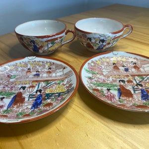 Two Japanese Porcelain Kutani Geisha Girl  Tea Cups & Saucers