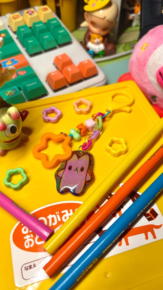 Purple Bun Dangly Keychain (shrink plastic)