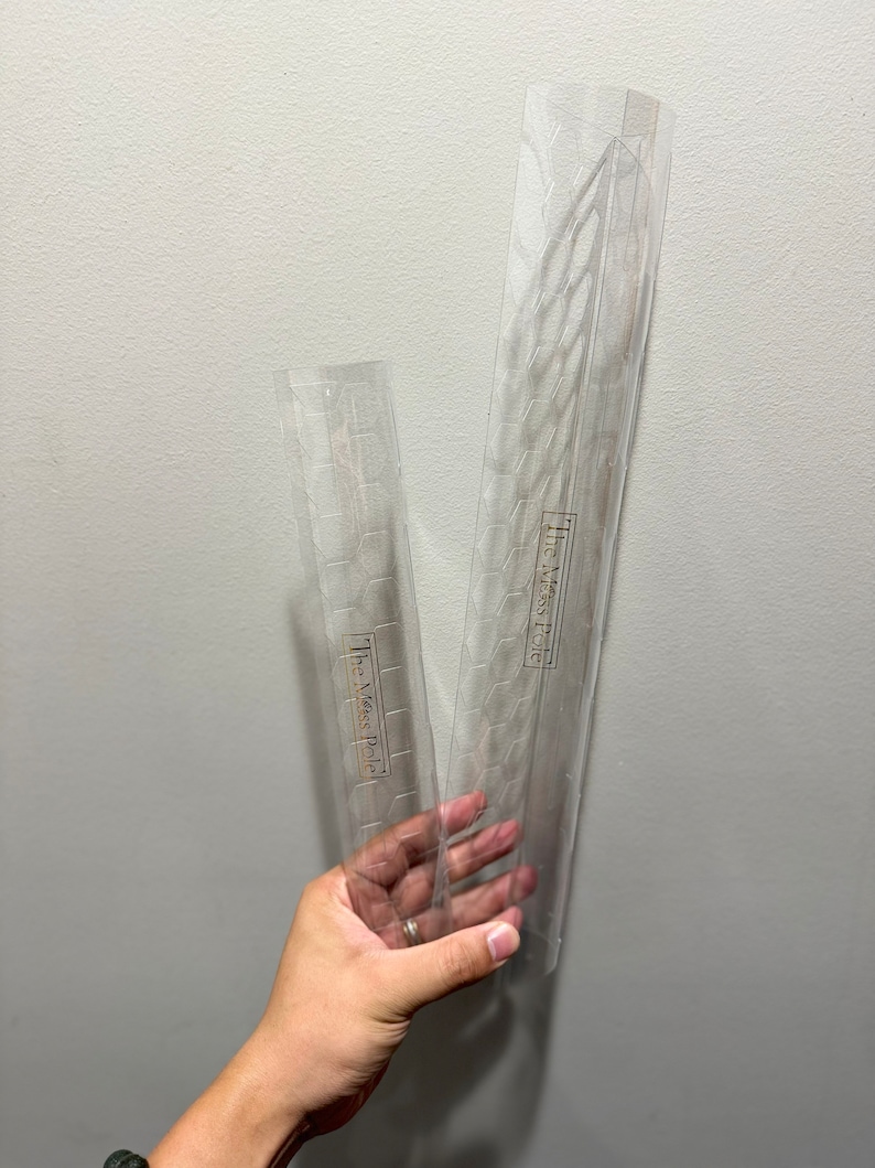 May include: Two clear plastic stencils with a geometric pattern. The stencils are labeled "The Miss Patina".