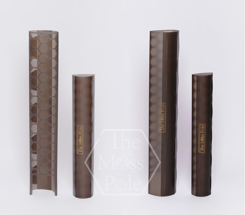 May include: Three different sizes of black pole grip covers with the text "The Miss Pole" printed in gold on each. The covers have a textured surface.