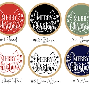 May include: Six circular stickers featuring the text Merry Christmas in a decorative script font, accompanied by line-art pine trees and snowflakes. The designs include red, black, sage green, white with red text, white with black text, and navy blue.