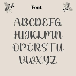 May include: A font alphabet in a handwritten style. The letters are in uppercase and are written in a cursive script. The letters are in black and are on a light beige background.