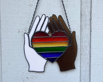 Handmade pride hands stained glass suncatcher