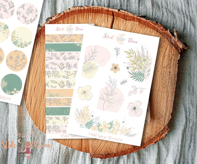 May include: A set of floral themed stickers with pastel colors. The stickers include a variety of floral designs, including leaves, flowers, and branches. The stickers are perfect for adding a touch of whimsy to planners, journals, and other paper crafts.
