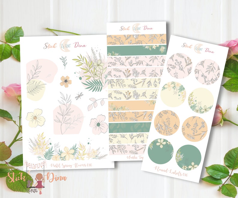 May include: Three sheets of printable stickers featuring floral designs. The first sheet has pastel spring flowers, the second sheet has a floral pattern with a "Washi Tay" label, and the third sheet has round labels with a "Round Labels 016" label.