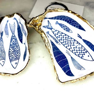 Blue Fish Gift, Trinket Oyster Shell dish gold finish, gold leaf trinket tray, shell oyster dish, personalised oyster shell trinket, decorative oyster shells, Fish Design key bowl, blue and gold dishes, fish ring dish, golden trinket dish, bride shell dish, shell jewellery bowl, decoupaged earrings dish, shell art trinket, art dish, Gold shell trinket holder, painted shell with gold, shell jewellery dish, Emma Wade art, Proposal Ring Tray, Painted Key Bowl, Bride shell Dish
