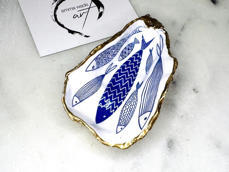Blue Fish Gift, Trinket Oyster Shell dish gold finish, gold leaf trinket tray, shell oyster dish, personalised oyster shell trinket, decorative oyster shells, Fish Design key bowl, blue and gold dishes, fish ring dish, golden trinket dish, bride shell dish, shell jewellery bowl, decoupaged earrings dish, shell art trinket, art dish, Gold shell trinket holder, painted shell with gold, shell jewellery dish, Emma Wade art, Proposal Ring Tray, Painted Key Bowl, Bride shell Dish
