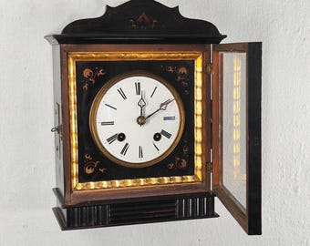 Antique Black Forest painted ebonised wall clock from around 1840